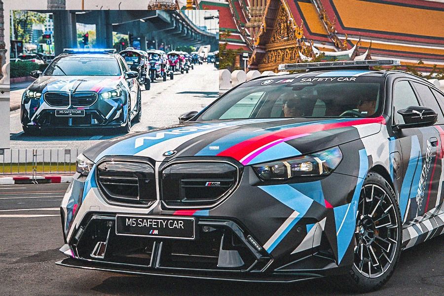 BMW M5 Touring MotoGP Safety Car saat diperkenalkan di jalan-jalan kota Bangkok, Thailand. Mobil ini diyakini akan menarik perhatian sepanjang MotoGP 2025. (Hendy AS/Skor.id)