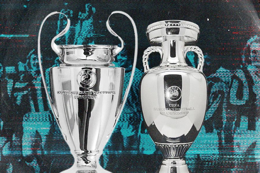 Trofi Liga Champions dan Piala Eropa (Jovi Arnanda/Skor.id).