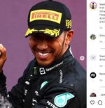 Lewis Hamilton Membasahi Gadis Grid dengan Sampanye