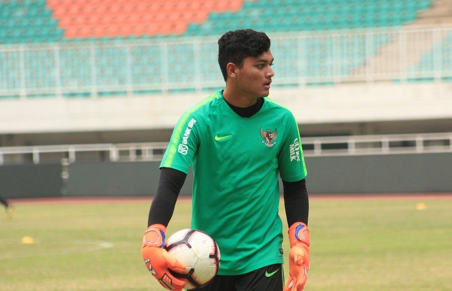 Muhammad Adi Satryo, kiper timnas Indonesia U-19, saat mengikuti pemusatan latihan timnas Indonesia U-19 pada Juli 2019.