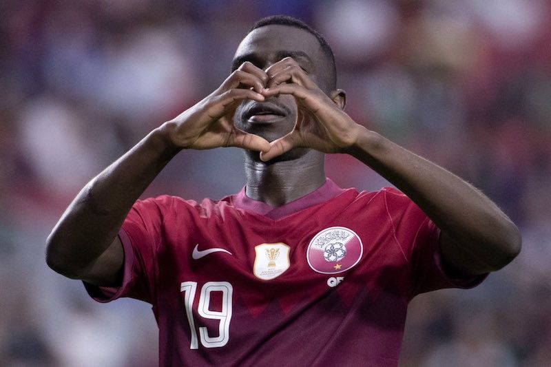 Pemain Qatar, Almoez Ali, merayakan gol ke gawang El Savador pada perempat final Piala Emas CONCACAF 2021, Minggu (25/7/2021).