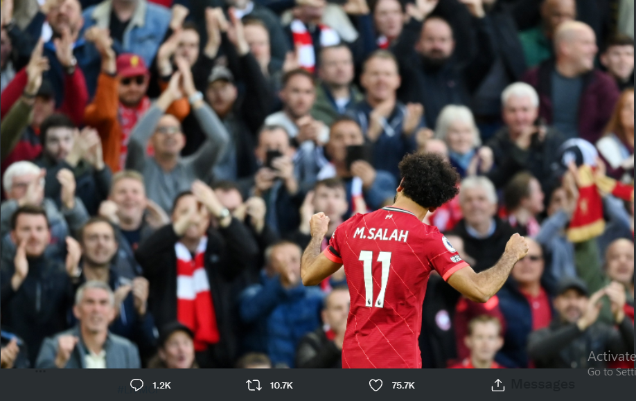 Penyerang Liverpool, Mohamed Salah merayakan golnya ke gawang Man City.