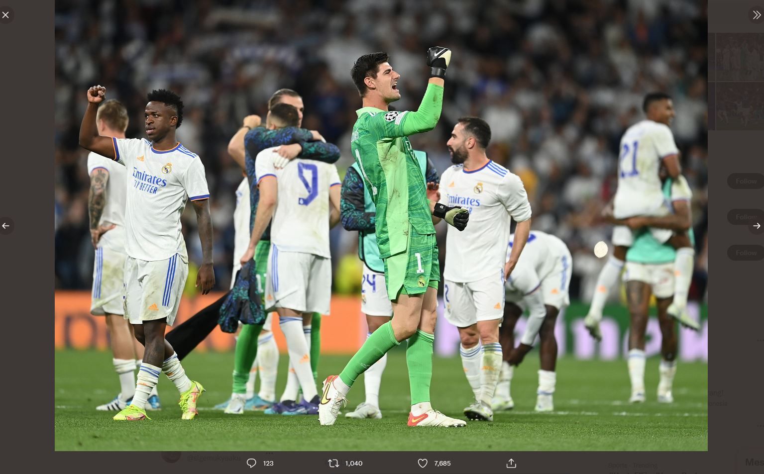 Thibaut Courtois, Vinicius Junior, dan para pemain Real Madrid merayakan kemenangan atas Manchester City di semifinal Liga Champions.