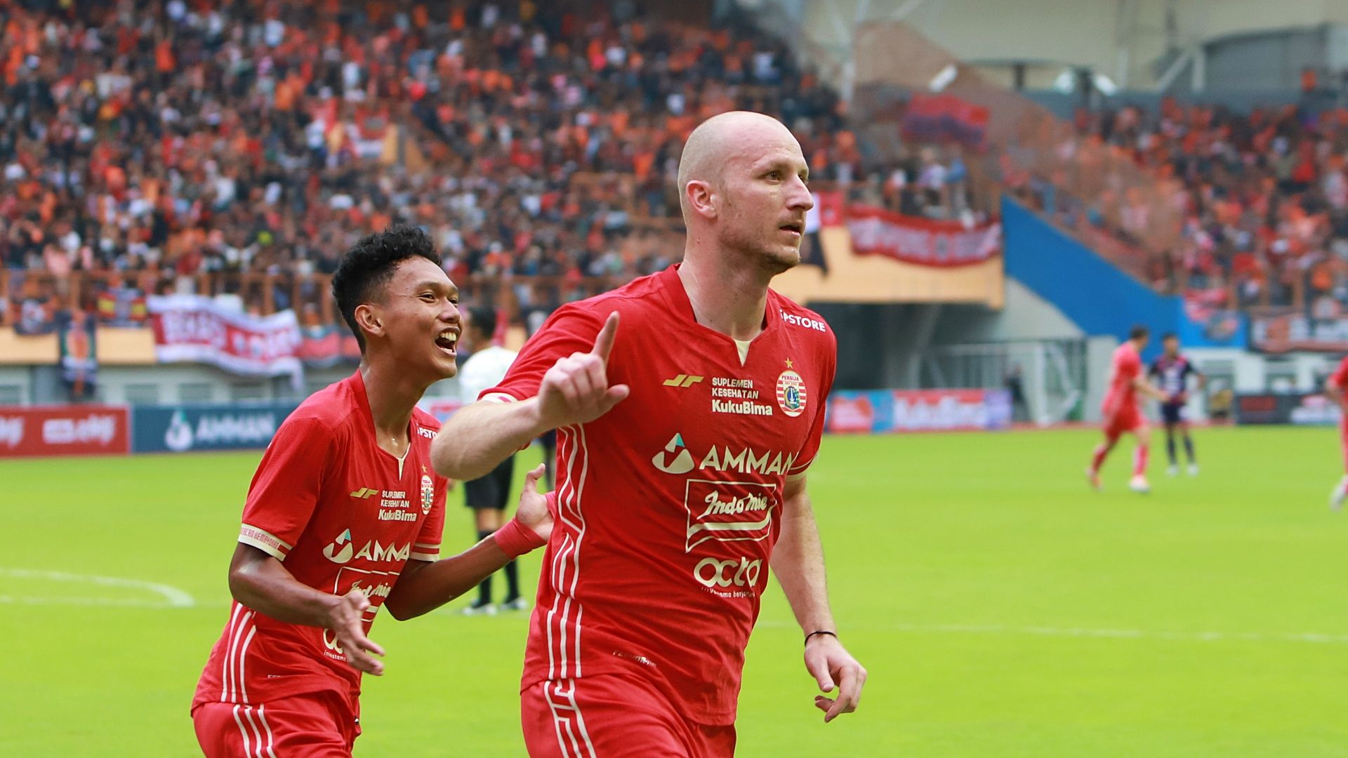 Michael Krmencik merayakan gol saat Persija Jakarta melawan Rans Nusantara FC di Stadion Wibawa Mukti, Cikarang, Sabtu (16/7/2022).