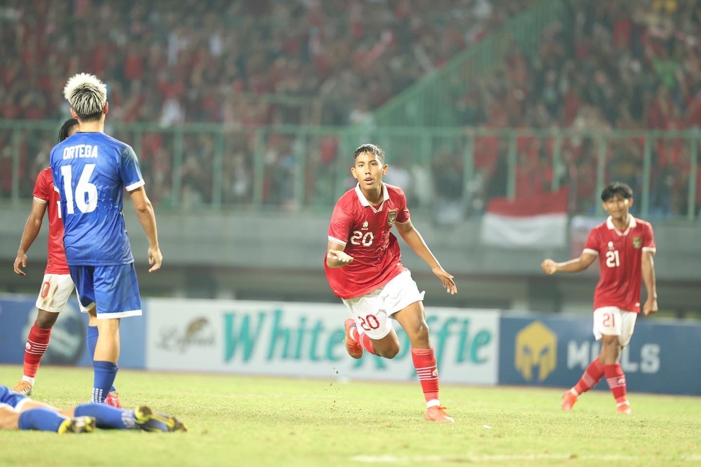 Ekspresi penyerang timnas U-19 Indonesia, Razzaa Fachrezi usai mencetak gol saat menghadapi Filipina U-19 di Piala AFF 2022.