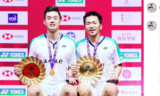 Ekspresi Lee Yang(kanan)/Wang Chi-Lin, ganda putra Taiwan, ketika memenangi BWF World Tour Finals 2020 di Bangkok, Thailand, Minggu (31/1/2021).