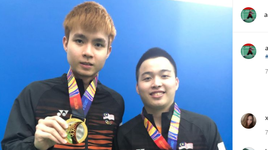 Ganda putra Malaysia, Aaron Chia (kanan)/Soh Wooi Yik, menang medali emas SEA Games 2019 di Filipina.