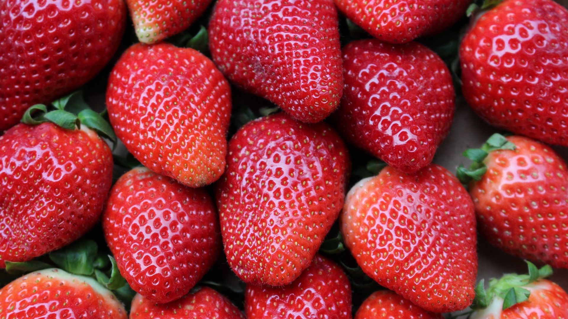 Ilustrasi buah strawberry yang memiliki berbagai manfaat kesehatan.