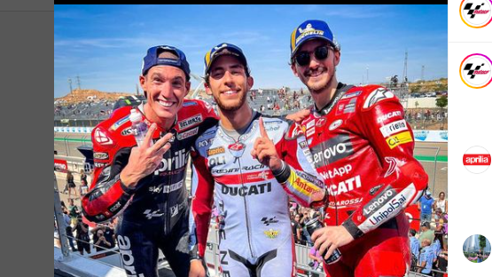 Para peraih podium MotoGP Aragon 2022 (dari kiri ke kanan), Aleix Espargaro, Enea Bastianini, dan Francesco Bagnaia.