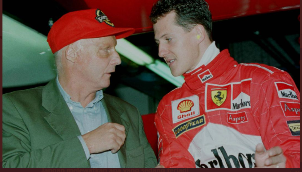 Niki Lauda (kiri) berbincang dengan Michael Schumacher saat masih berseragam Ferrari. Lauda dan Schumi mengalami nasib berbeda saat kembali ke F1 setelah sempat mundur. 