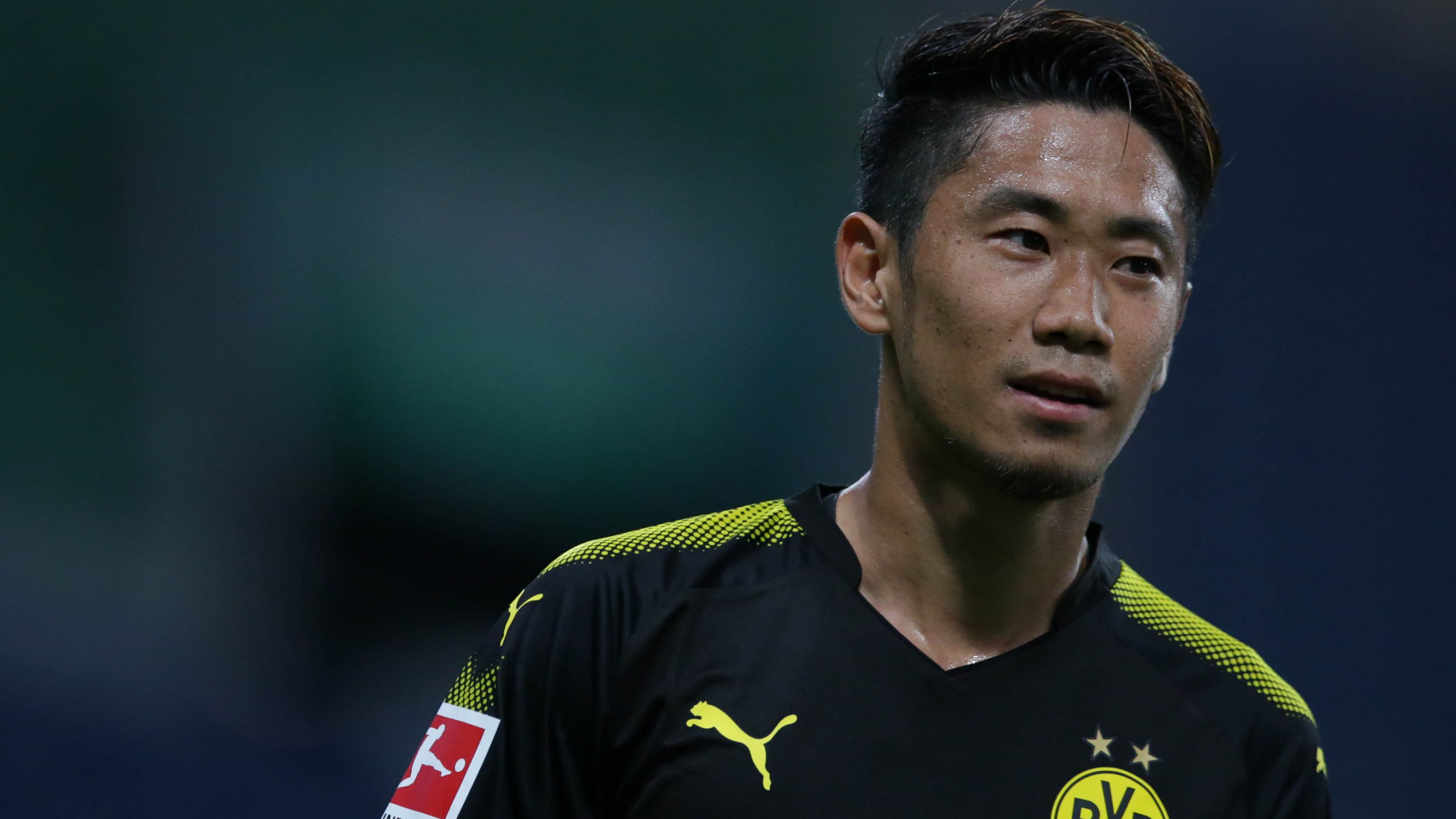 Shinji Kagawa saat masih bermain untukl Borussia Dortmund.