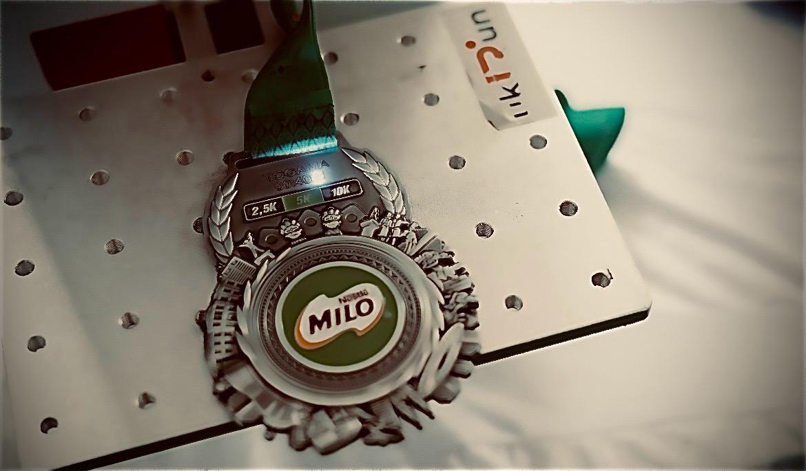 Medali Milo Activ Indonesia Race 2025 Jakarta International 10K. (Foto: Milo Activ Indonesia Race 2025/Grafis: Skor.id)